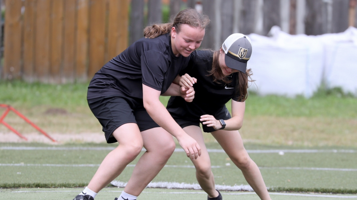 Young athletes in foundational training drill